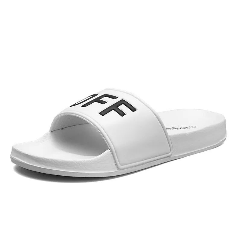 Men's black open-toe slippers with a rubber sole, shown from the side.