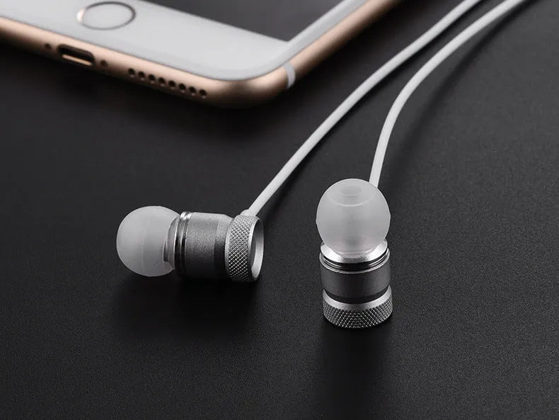 In-ear music video headphones with black TPE cable and ear tips