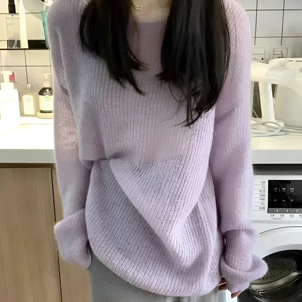 Purple loose-fitting women's blouse made of ice silk with sleeveless princess sleeves.