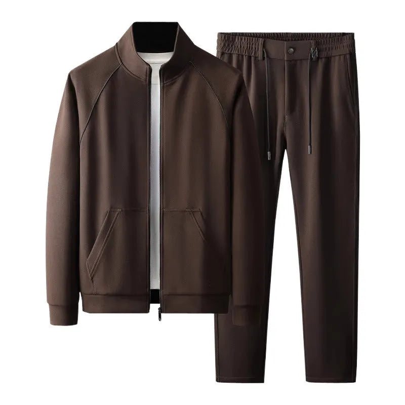 Man wearing a stand collar Vinylon sports suit set in slim fit, showing the coat and trousers.