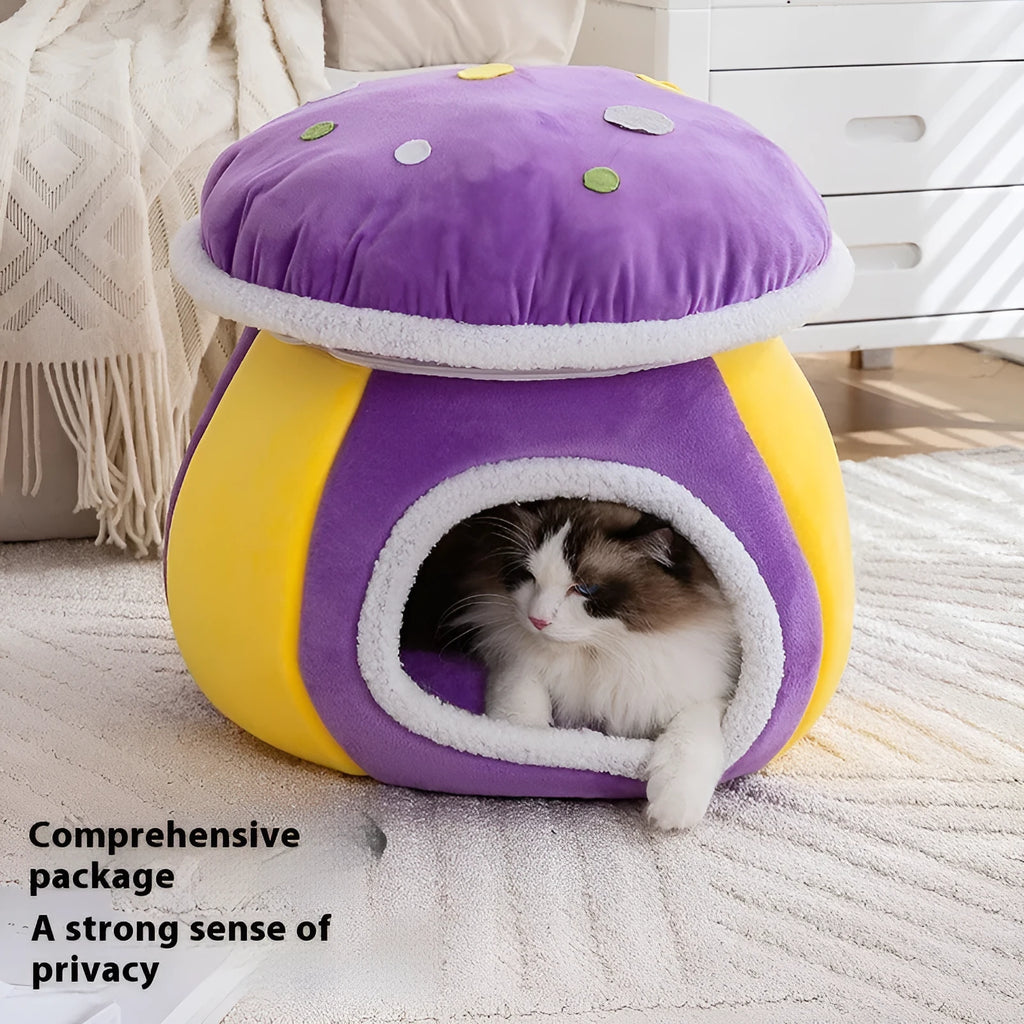 Purple mushroom-shaped cat nest bed with soft plush material and a separate blanket.