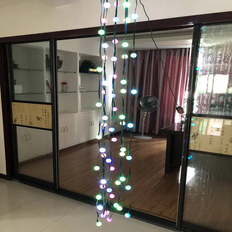 64 LED dazzler shower tree light string with dimming and colour change on a Christmas tree