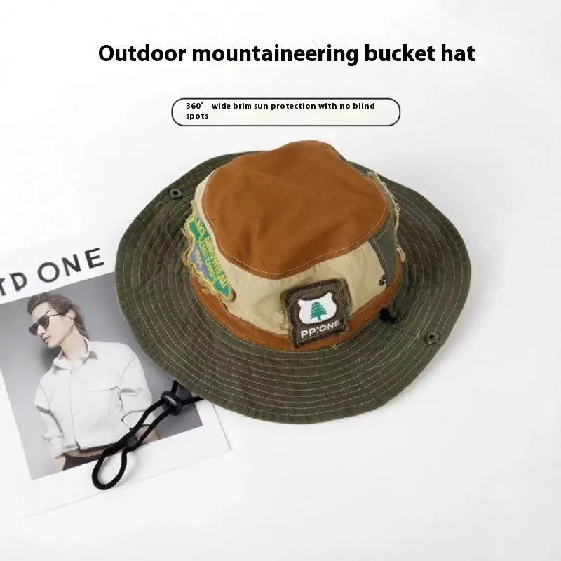 Army green cotton fisherman hat with retro patchwork design and flat top crown