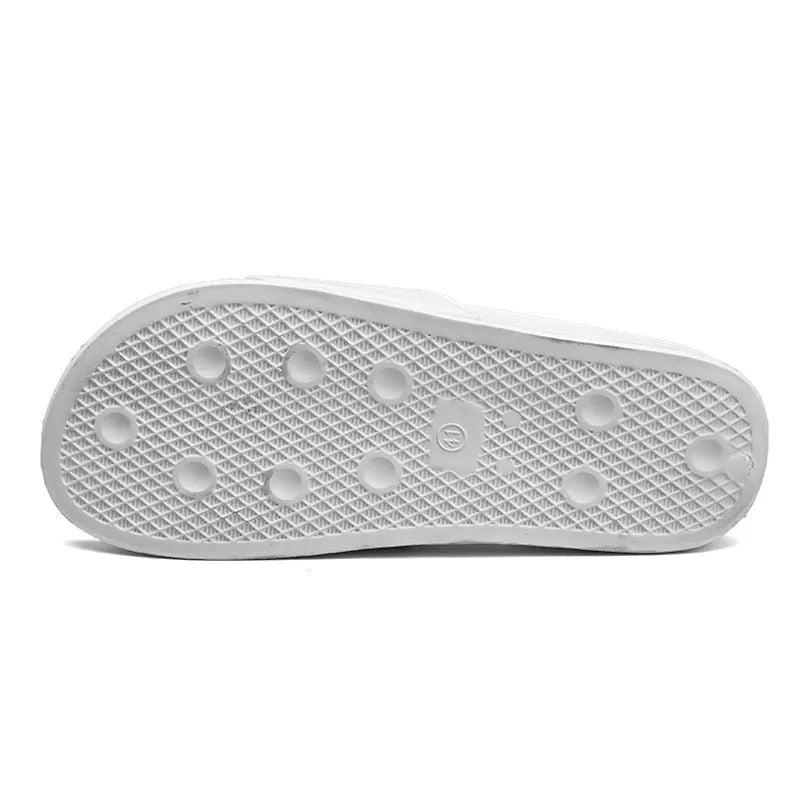 Men's black open-toe slippers with a rubber sole, shown from the side.