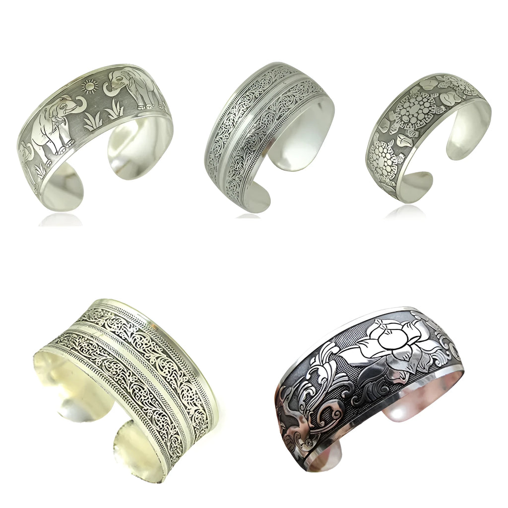 Carved open Miao silver alloy bracelet in Elephant and Turtle colour options with Roman shape