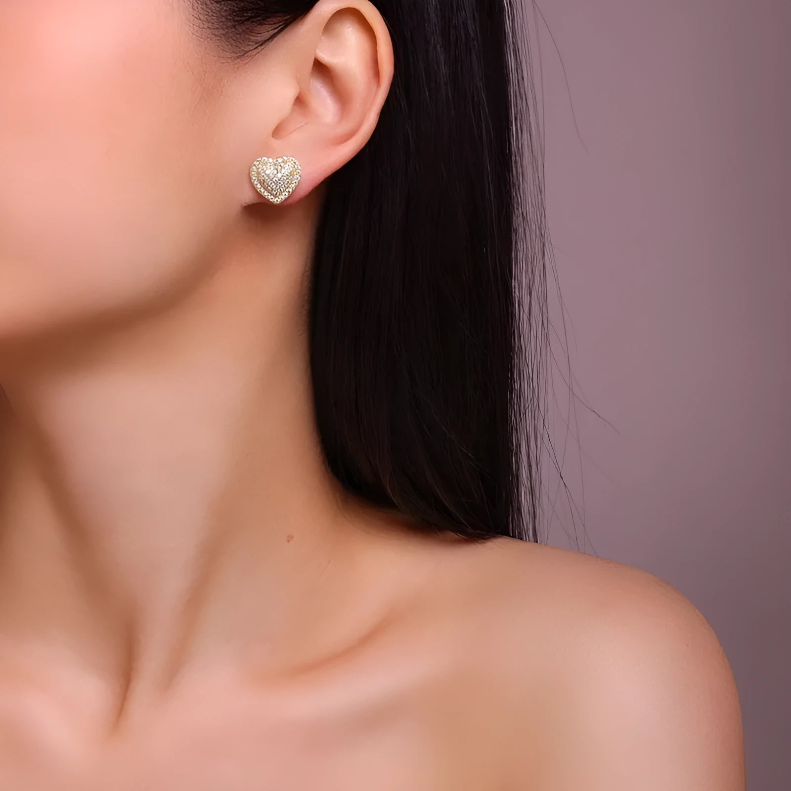 Pair of golden heart-shaped moissanite stud earrings on S925 silver posts