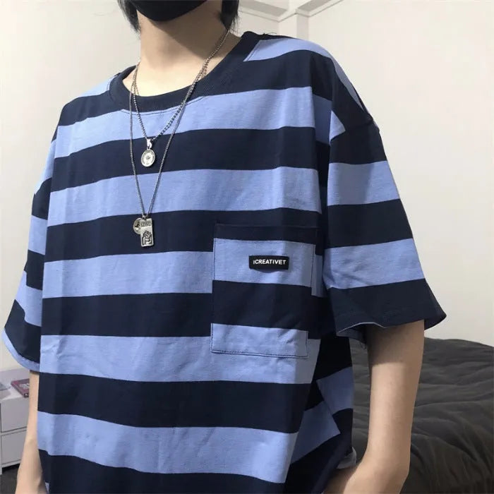 Striped short sleeve t-shirt in polyester fibre, available in blue and yellow, sizes L to XXL.