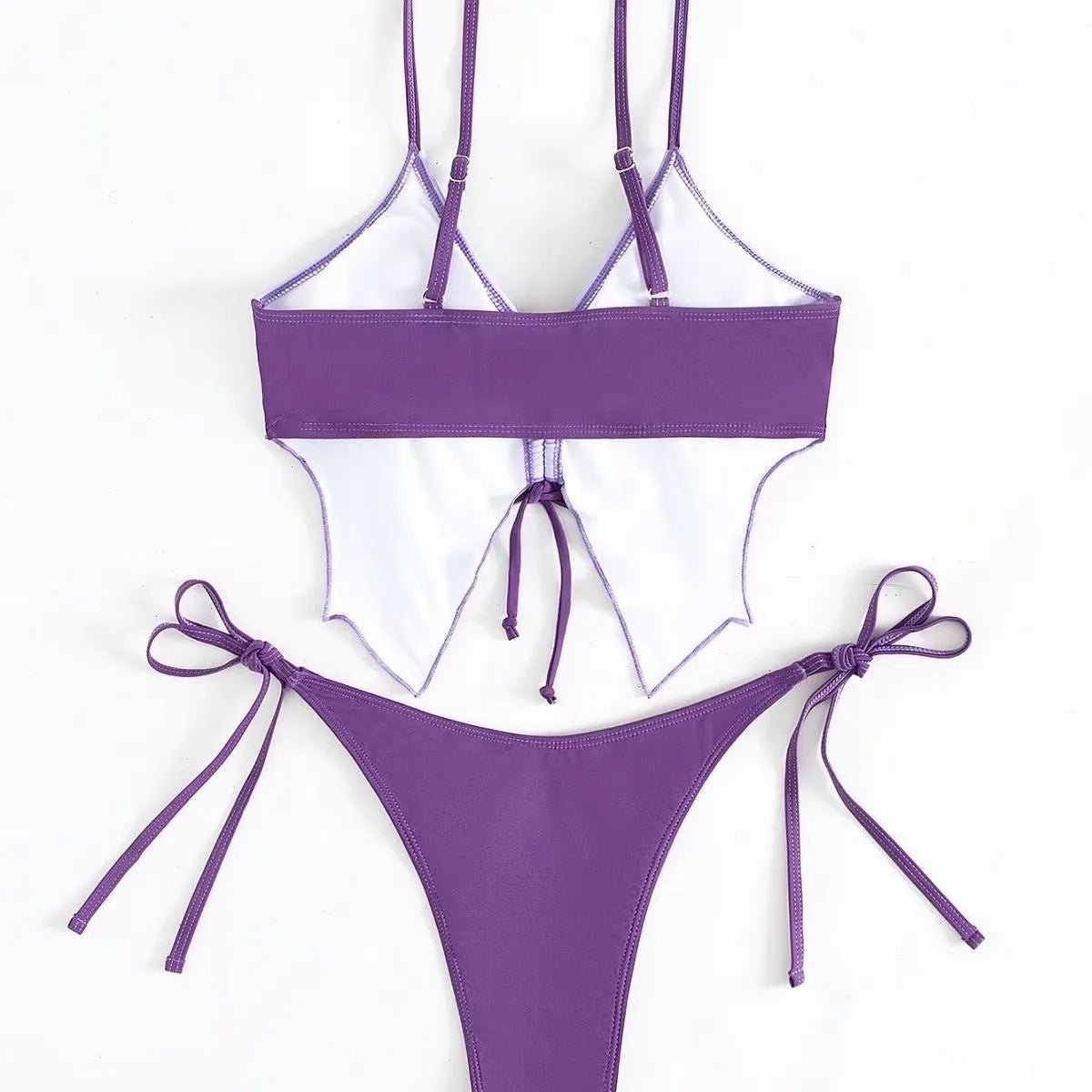 Women's purple split bikini suit with bow detail and briefs-style bottoms