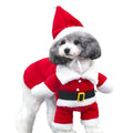 Red polar fleece pet Christmas costume with Santa Claus design on a standing dog