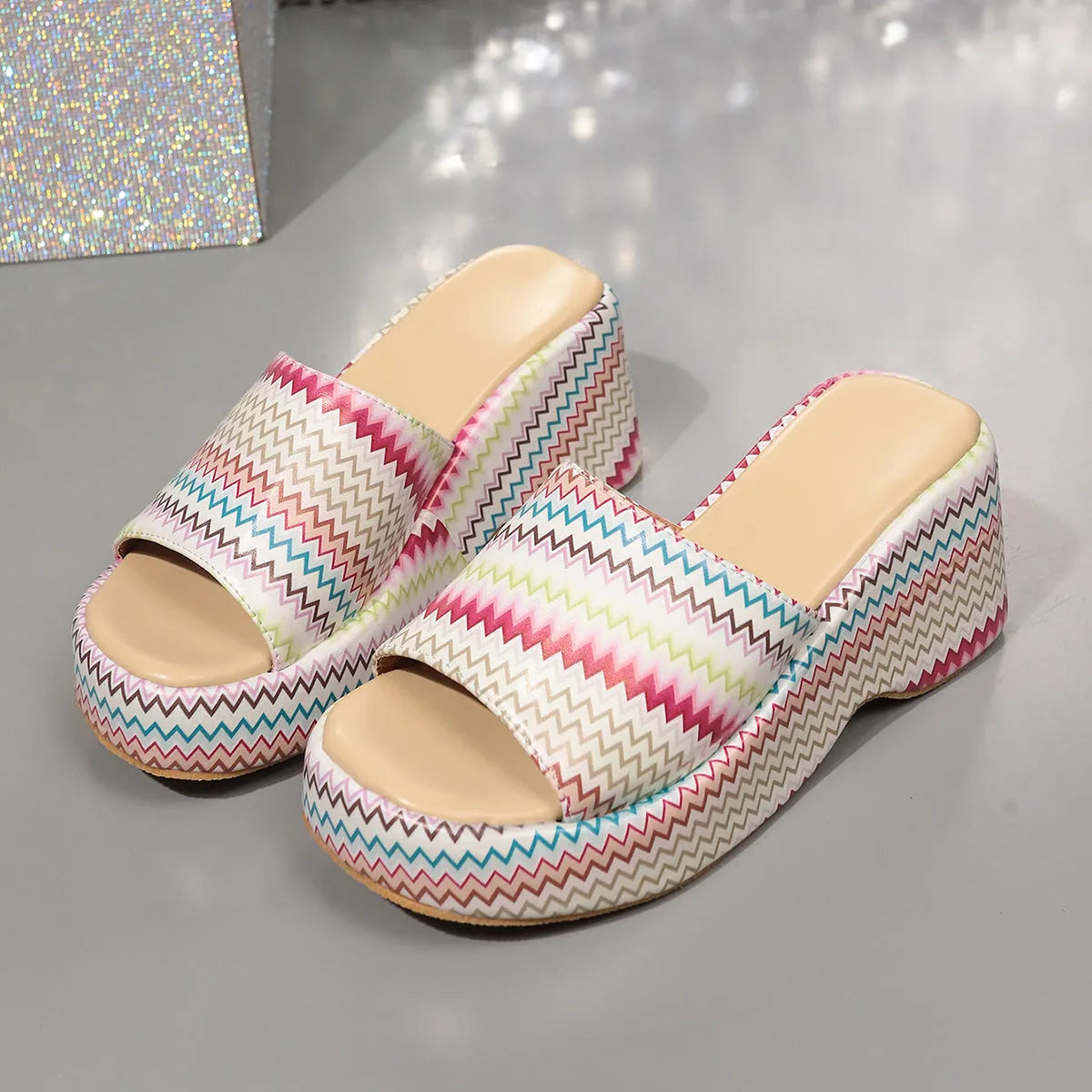 Women's wedge sandals with wave print design and fish mouth toe in beige, blue, and pink colours