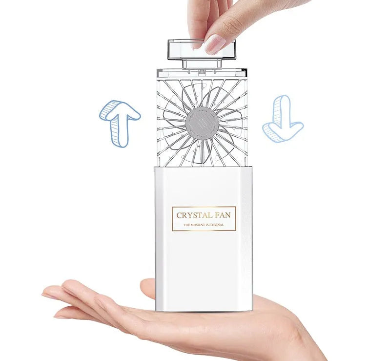 Pink portable perfume fan with mist spray and 1200mAH rechargeable battery
