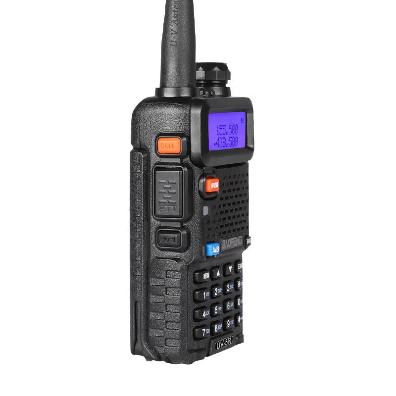 Black handheld dual-band two-way radio walkie talkie with antenna, LCD screen, and keypad.