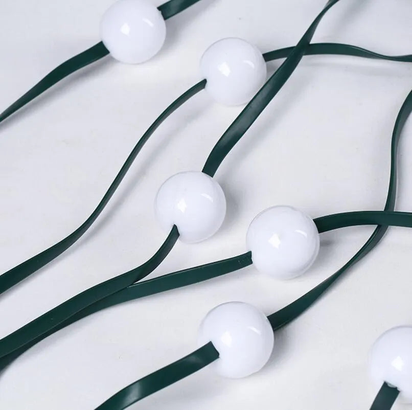 64 LED dazzler shower tree light string with dimming and colour change on a Christmas tree