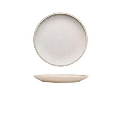 Blue matte ceramic plate with sesame point glaze on a table, 10 inch diameter.