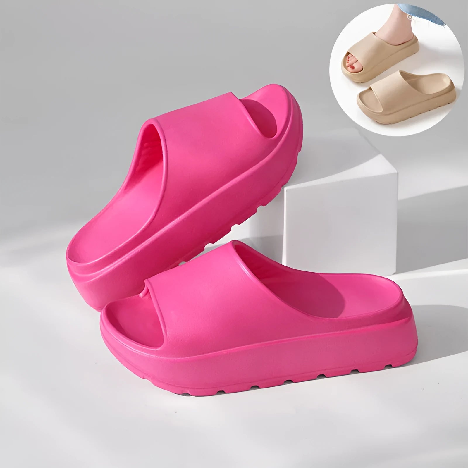 Women's beige fish mouth slippers with a thick 5.5cm light-coloured EVA sole on a wooden floor.