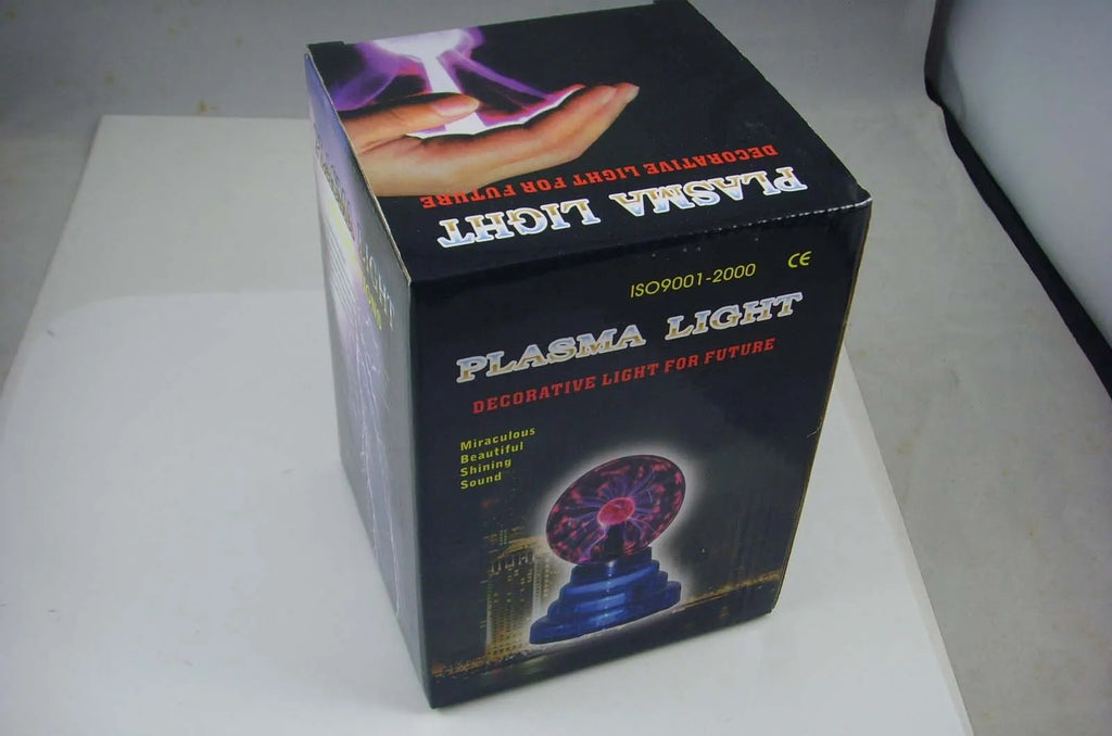 Anti-radiation magic ball light with colourful glow, 7.62cm glass sphere and ABS base on a desk