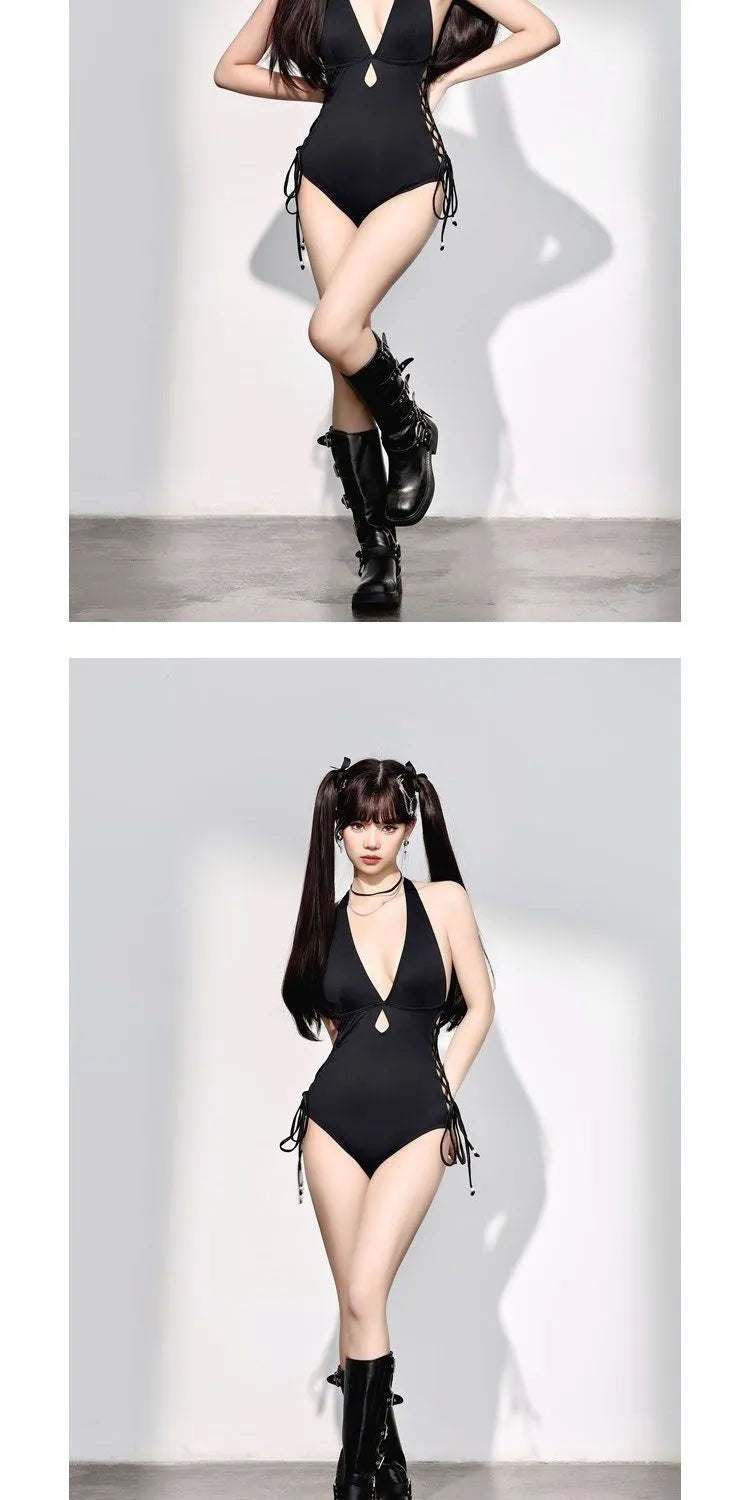 Women's V-neck hollow strap niche one-piece swimsuit in black polyester on a model