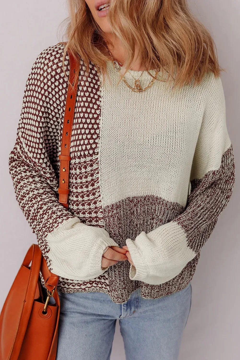 Dark khaki women's loose sweater with back tie closure and drop shoulders.