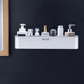 Hole-free plastic bathroom shelf mounted on wall holding shampoo and shower gel bottles in black finish