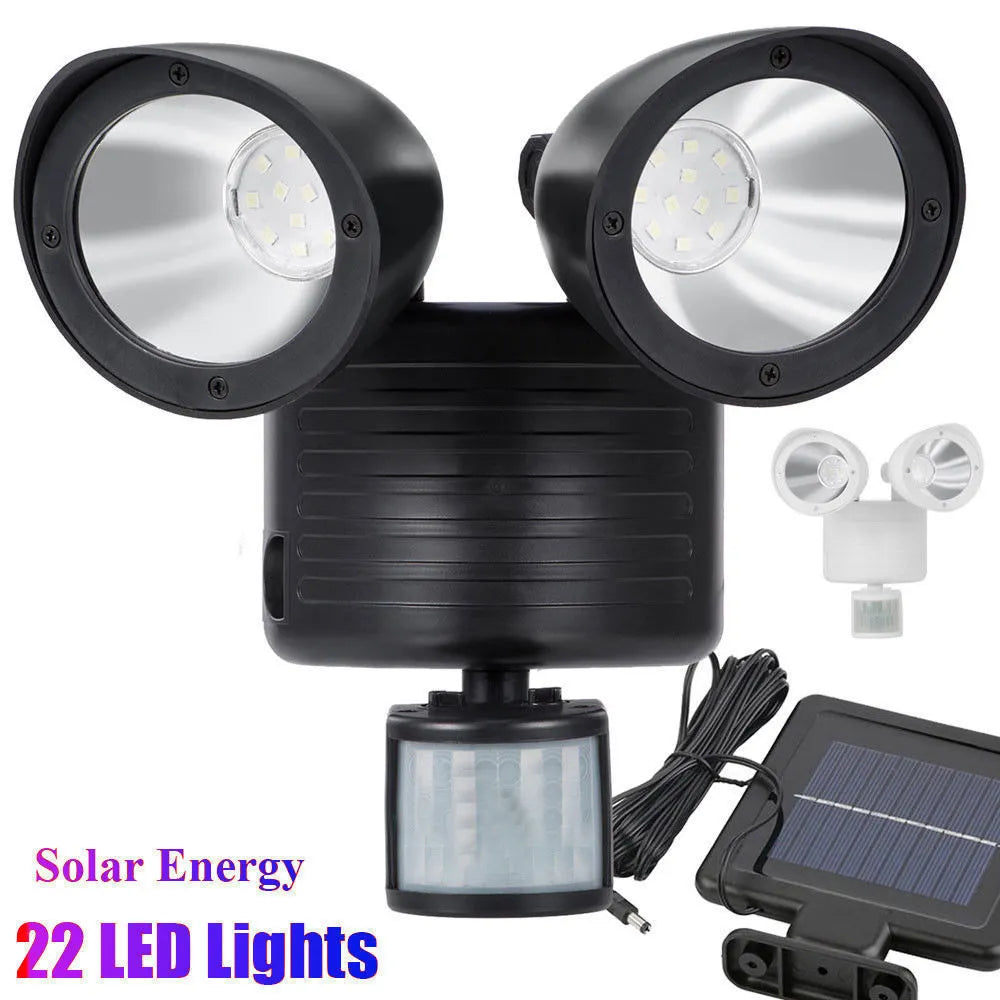 Double head solar induction spotlight in black mounted on a wall with motion sensor and LED light