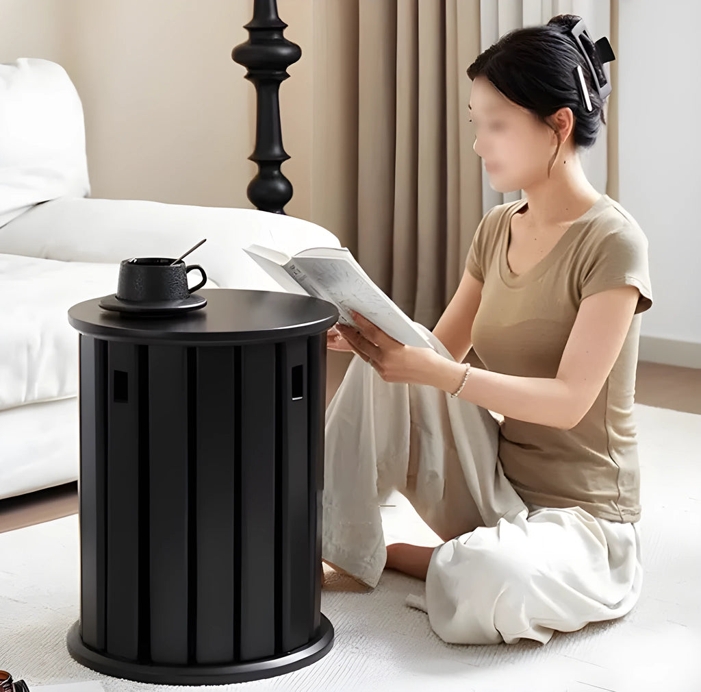 Large stackable iron dining stool in a modern style, shown in smoked black finish.