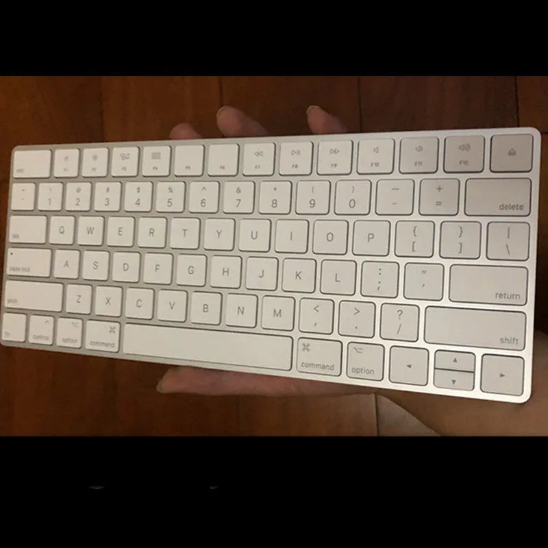 White Apple Bluetooth wireless keyboard with aluminium case and multimedia function keys