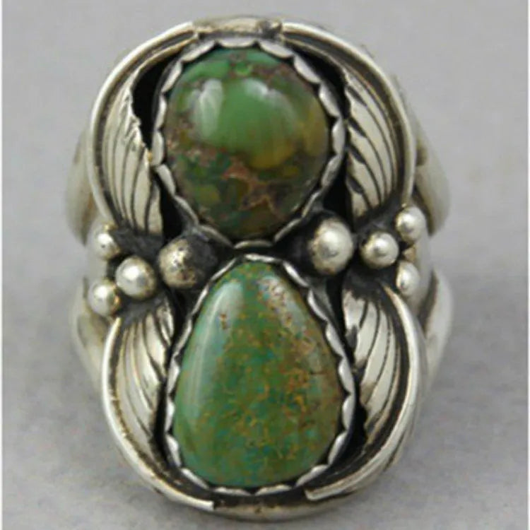 Turquoise geometric women's ring with electroplated alloy construction showing inlaid design details