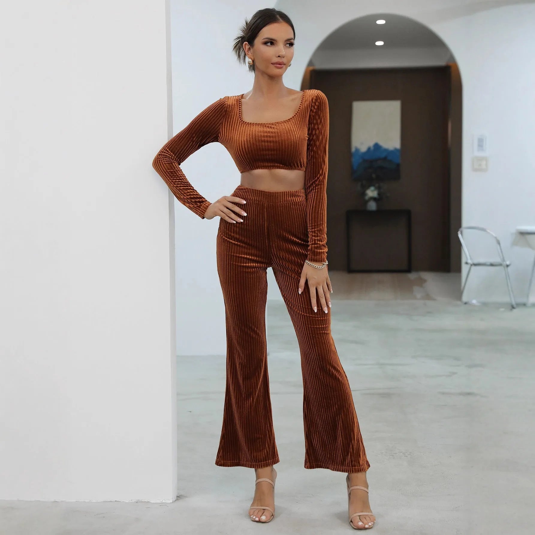 Caramel colour long sleeve sweater and trouser casual set laid flat