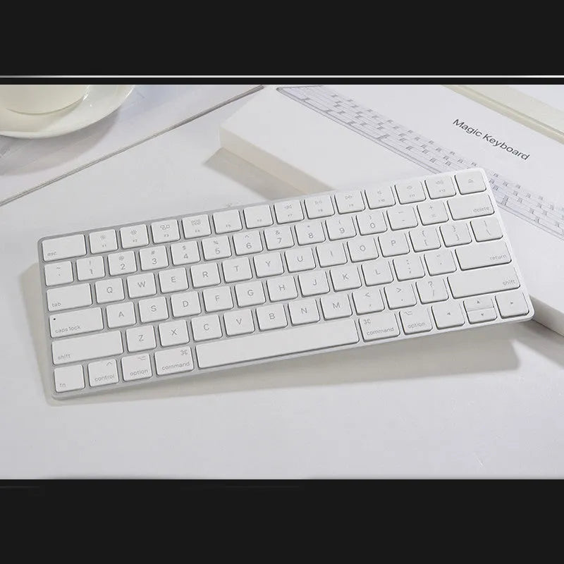 White Apple Bluetooth wireless keyboard with aluminium case and multimedia function keys