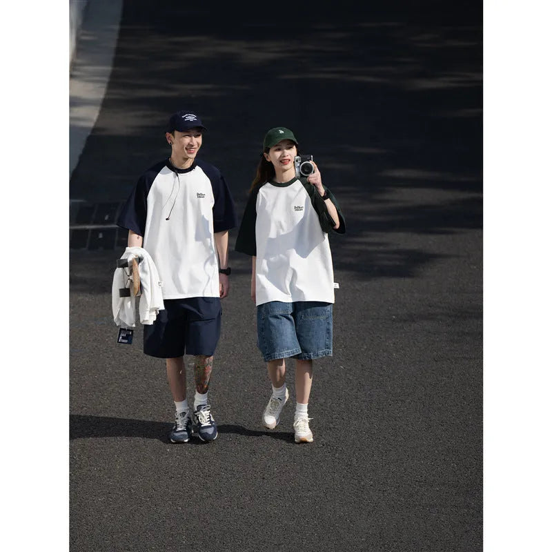 Blue loose-fit men's T-shirt with raglan sleeves in a Japanese Junior casual style.