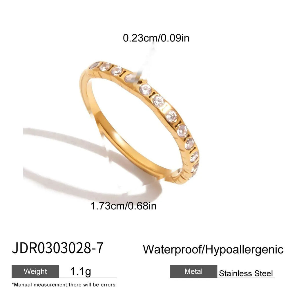 Geometric stainless steel ring with zircon stones in a silver-toned finish.