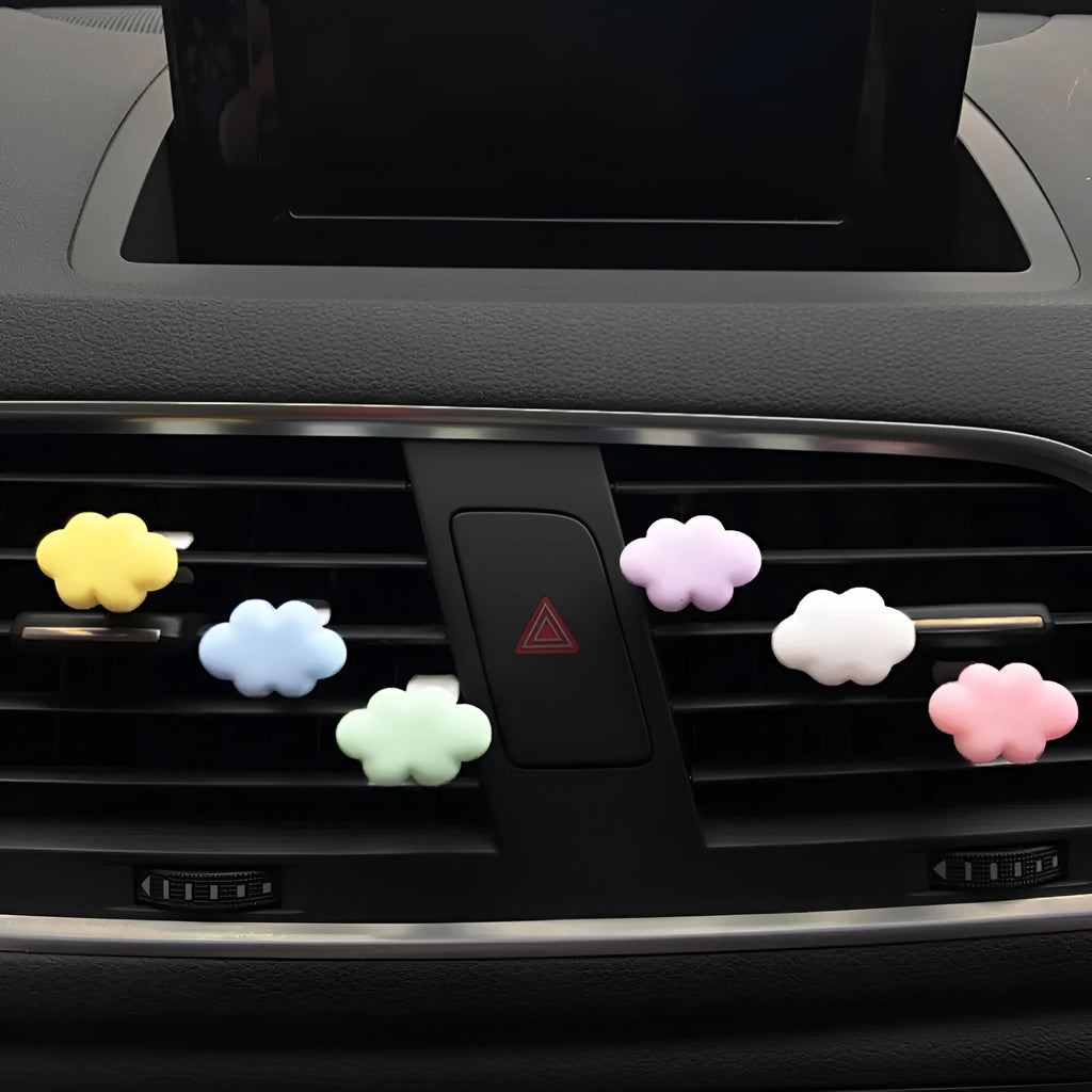 Resin Baiyun cartoon car fragrance clip in light green colour attached to car air vent