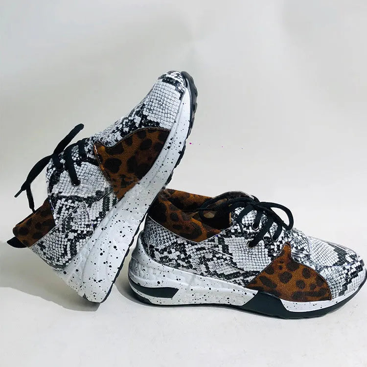 Women's suede casual sneakers with a wedge heel in leopard print colour.