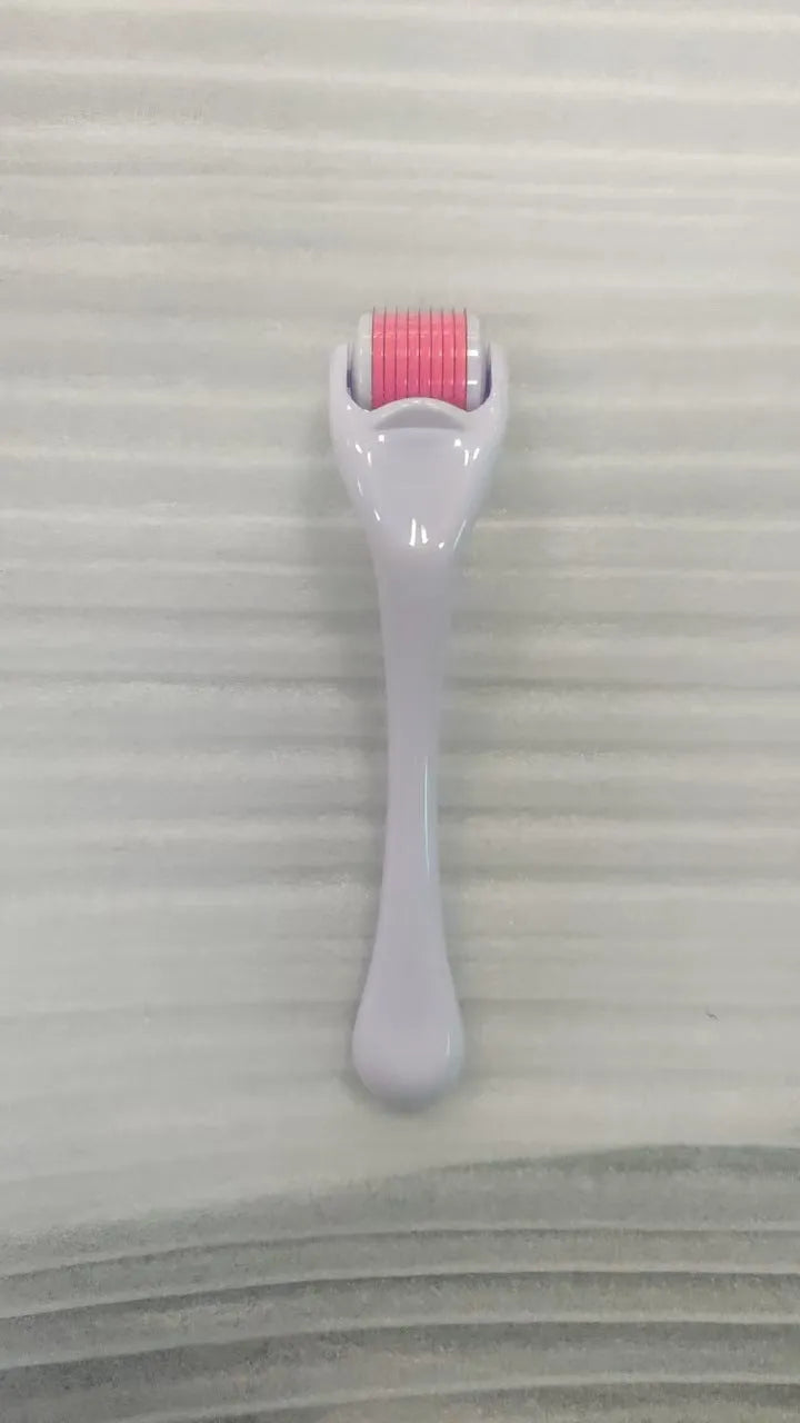 540 needle derma roller with black handle and coloured wheel, showing 0.25mm 0.3mm size options for micro-needling.