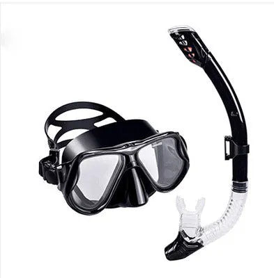 Diving goggles with transparent glass lens and blue silicone mask on an adjustable strap.
