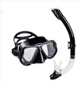 Diving goggles with transparent glass lens and blue silicone mask on an adjustable strap.
