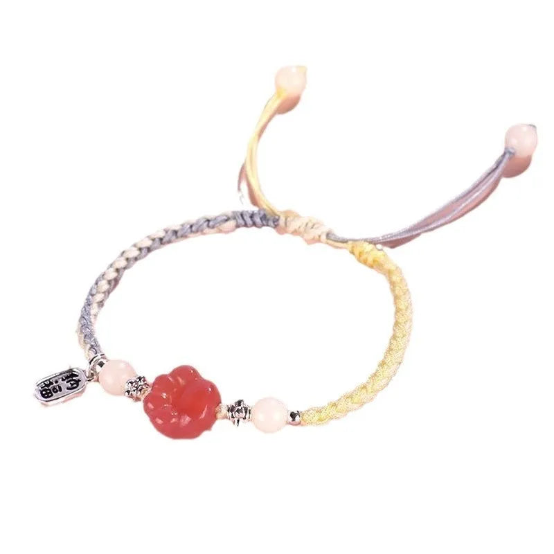 Handmade glass and coloured glaze cat's paw woven bracelet for couples in red, pink, or yellow