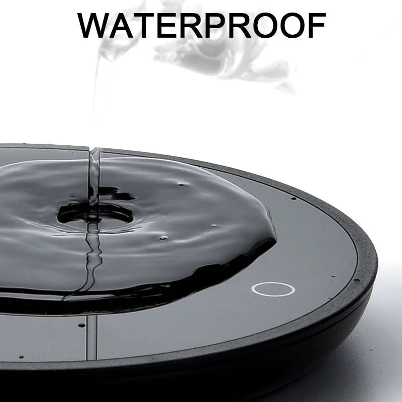 Black cup warmer with tempered glass surface and adjustable temperature control