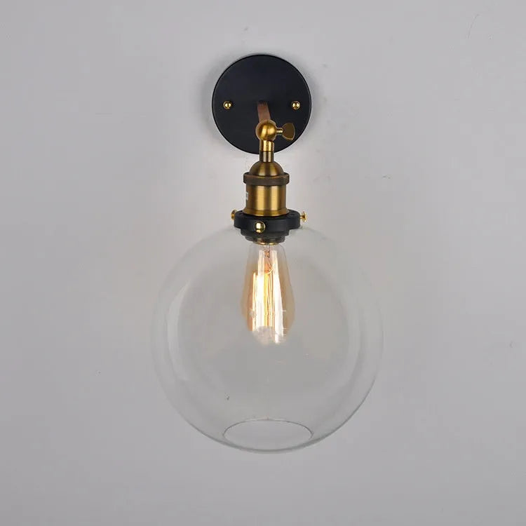 Retro round ball glass wall lamp with aluminium holder in amber, smoke grey, or transparent colour