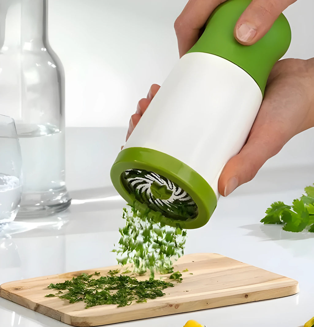 Herb grinder spice mill in white plastic with stainless steel blade and removable top for fresh herbs