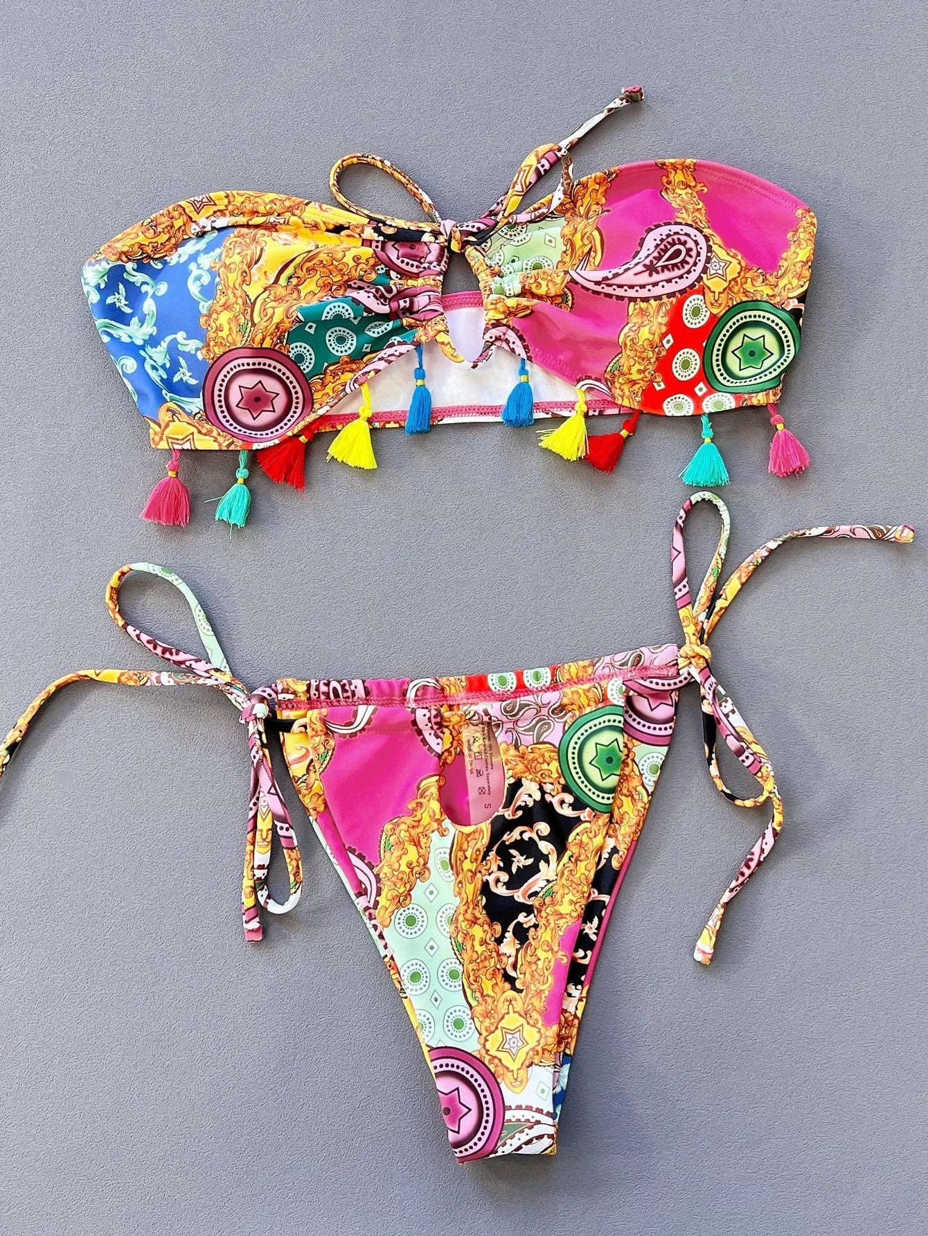 Women's printed separate tube top bikini set for swimming sports on a mannequin