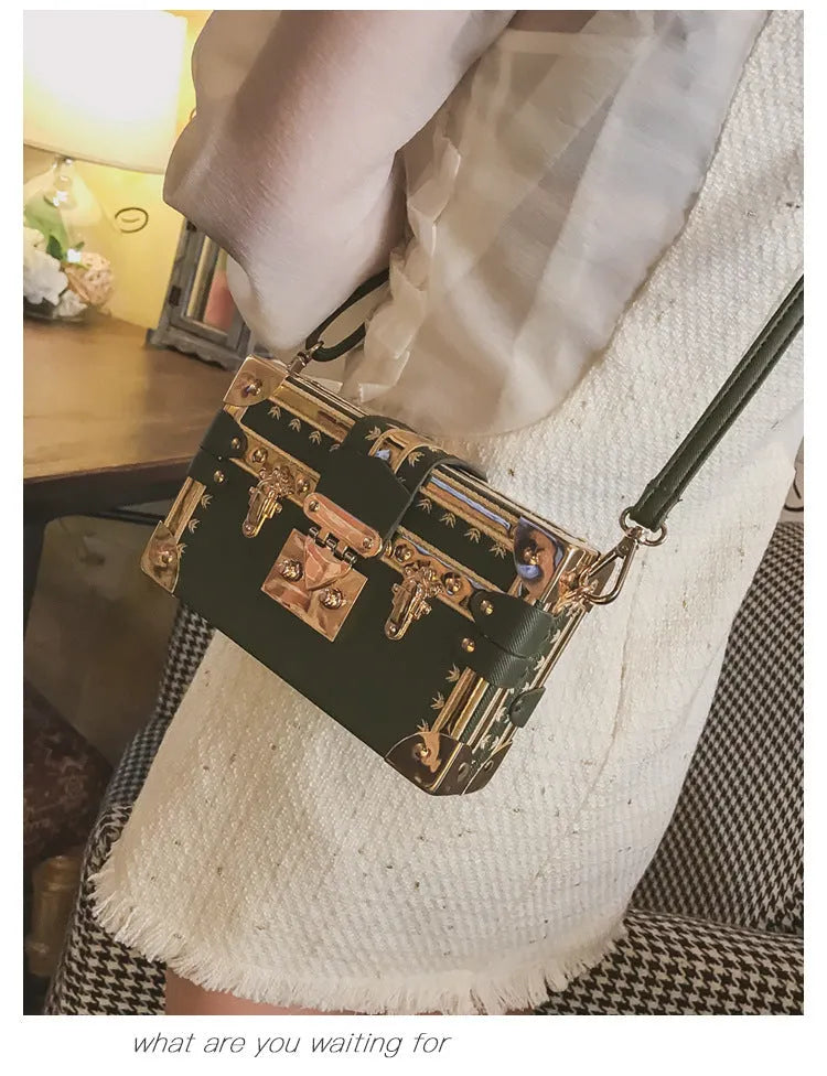 Hard-structured women's black PU leather shoulder bag with flap and rivet decoration