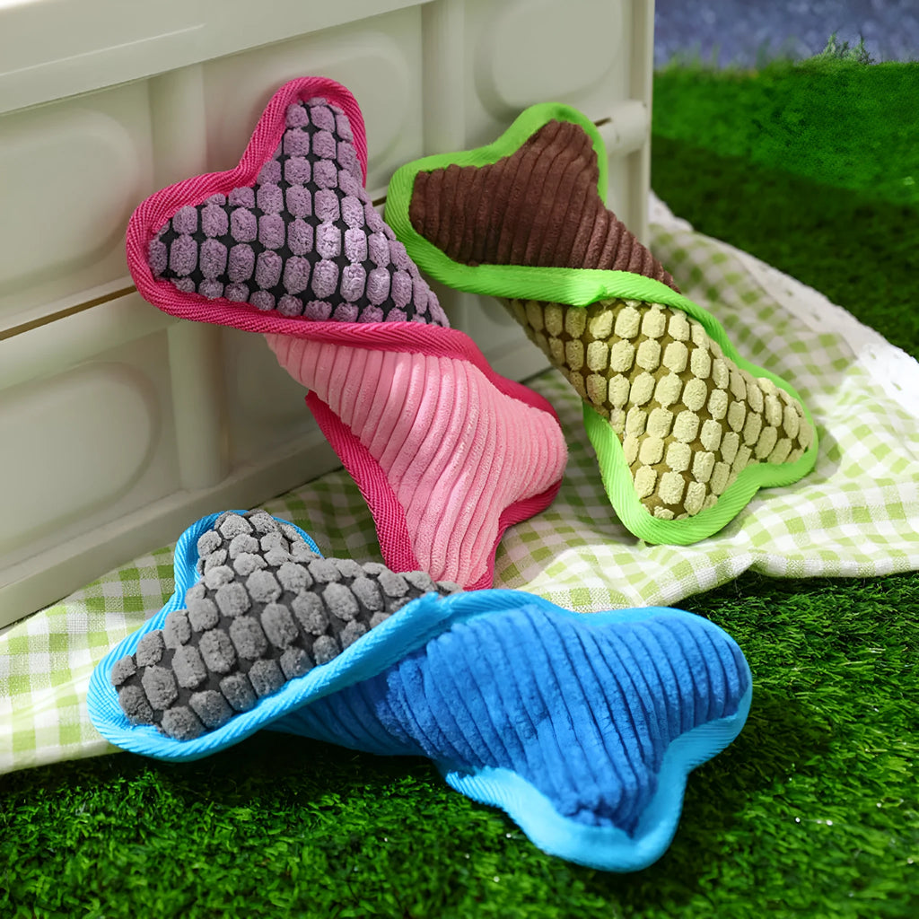 Bite-resistant teddy dog toy with sound bone model in blue, green, and pink colours