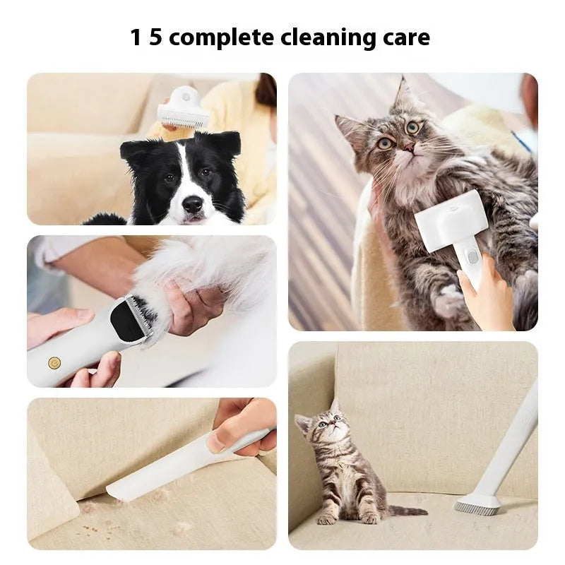 Pink and white pet grooming vacuum cleaner with electric clippers, flat suction head, and grooming tools on a white background