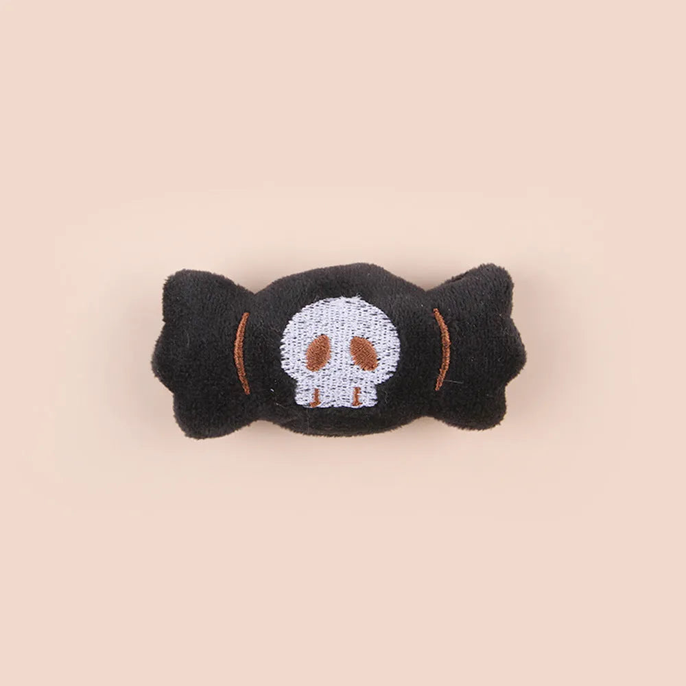 Small plush cat teaser toy with wand and colourful attachments for feline play