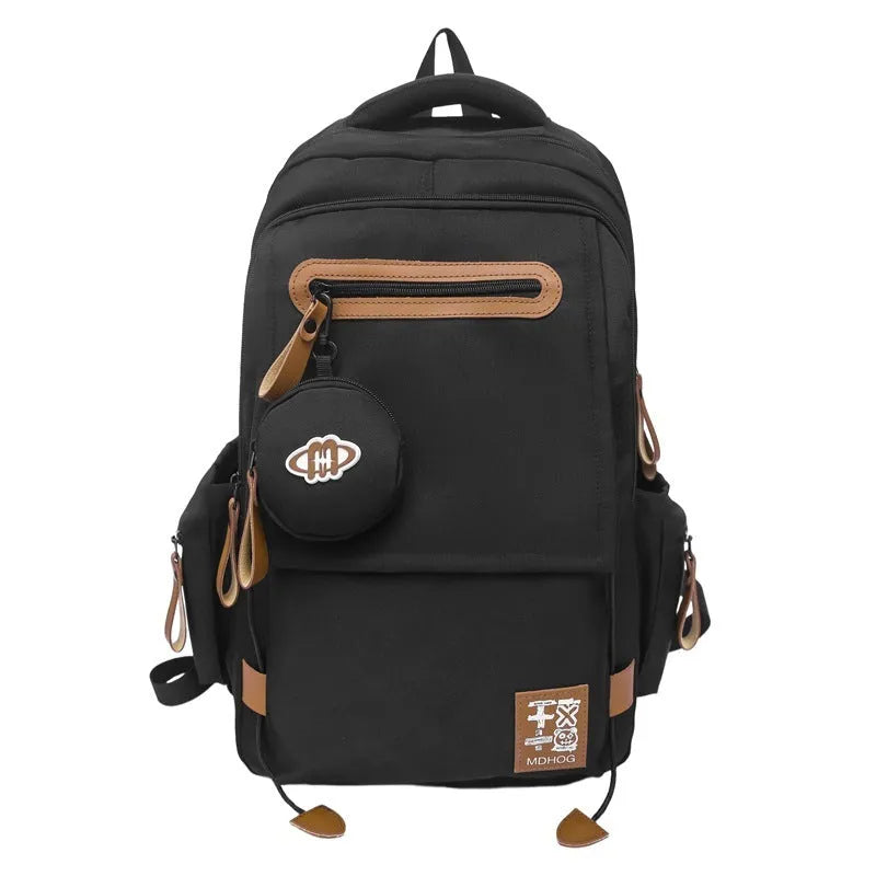 Japanese large capacity leisure travel backpack in black nylon with contrast stitching and waterproof finish