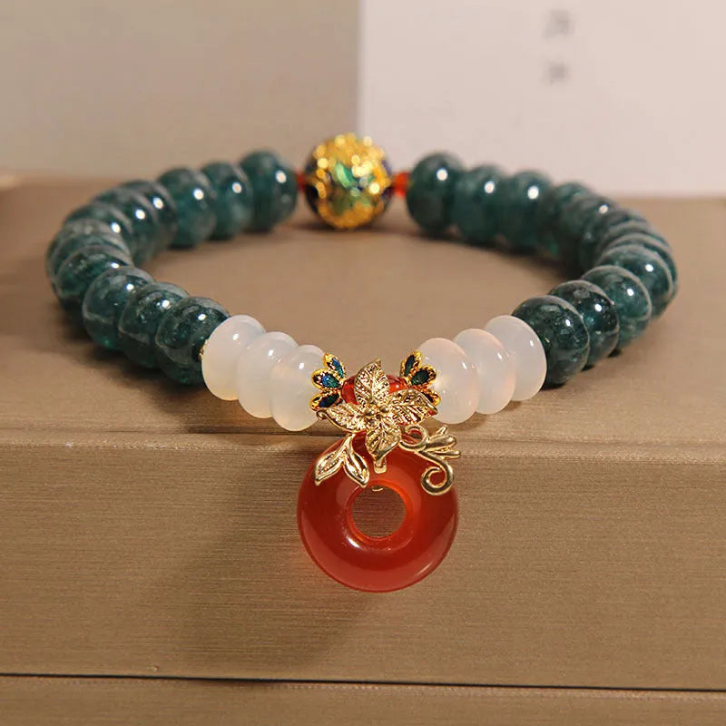 Blue water jade abacus beads crystal bracelet with red agate peace buckle and rhinestone accents for women