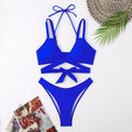 Solid colour strappy women's bikini swimsuit with adjustable side ties and removable padded cups.