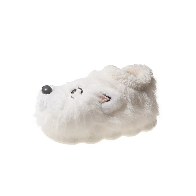 Pair of grey ankle wrap cotton slippers with plush upper and artificial wool lining on a home floor