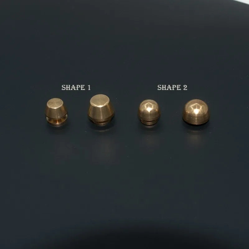 Brass decorative buckle with antique foot nail design in four size variations